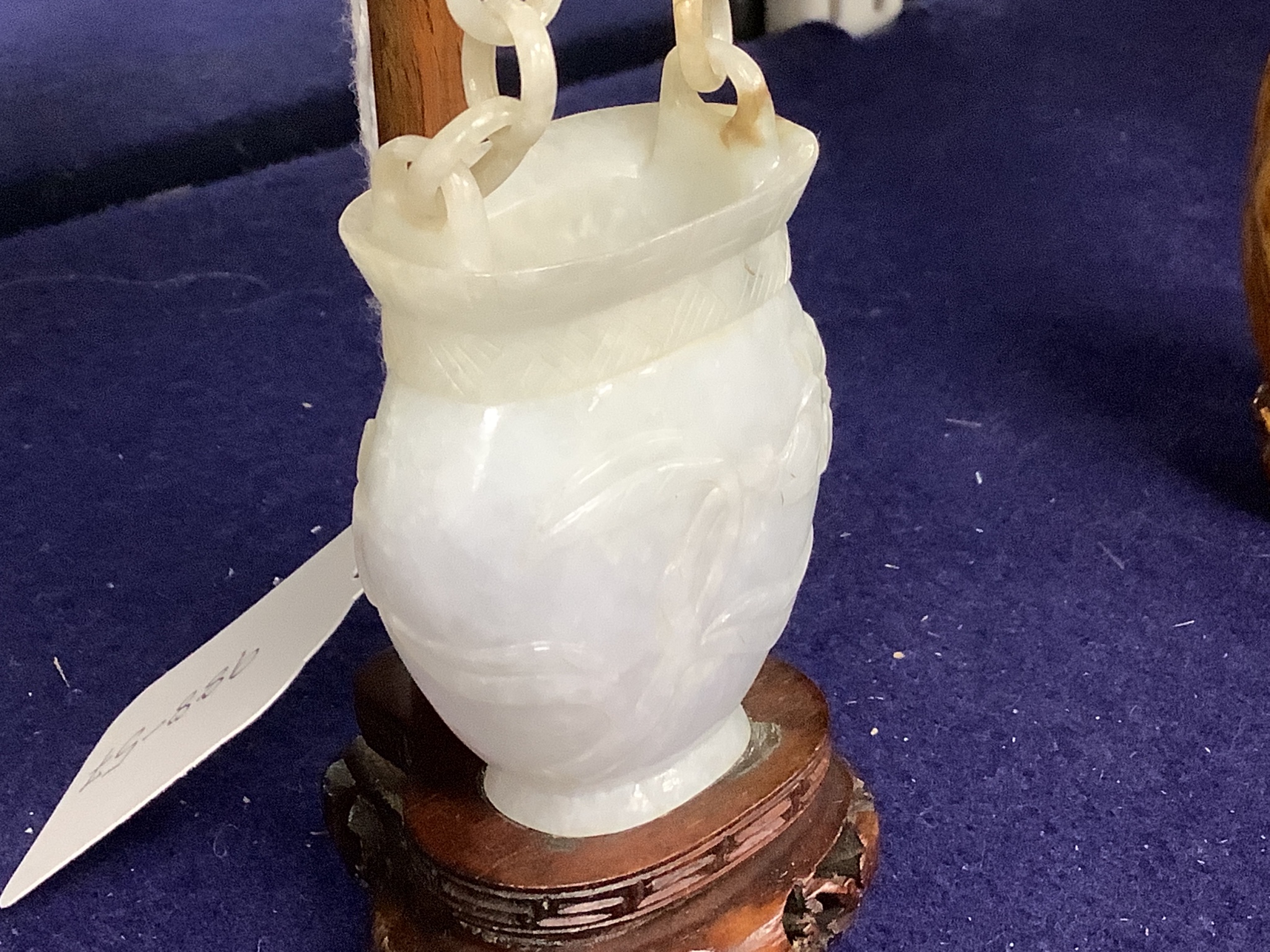 A Chinese celadon jadeite model of a flower basket